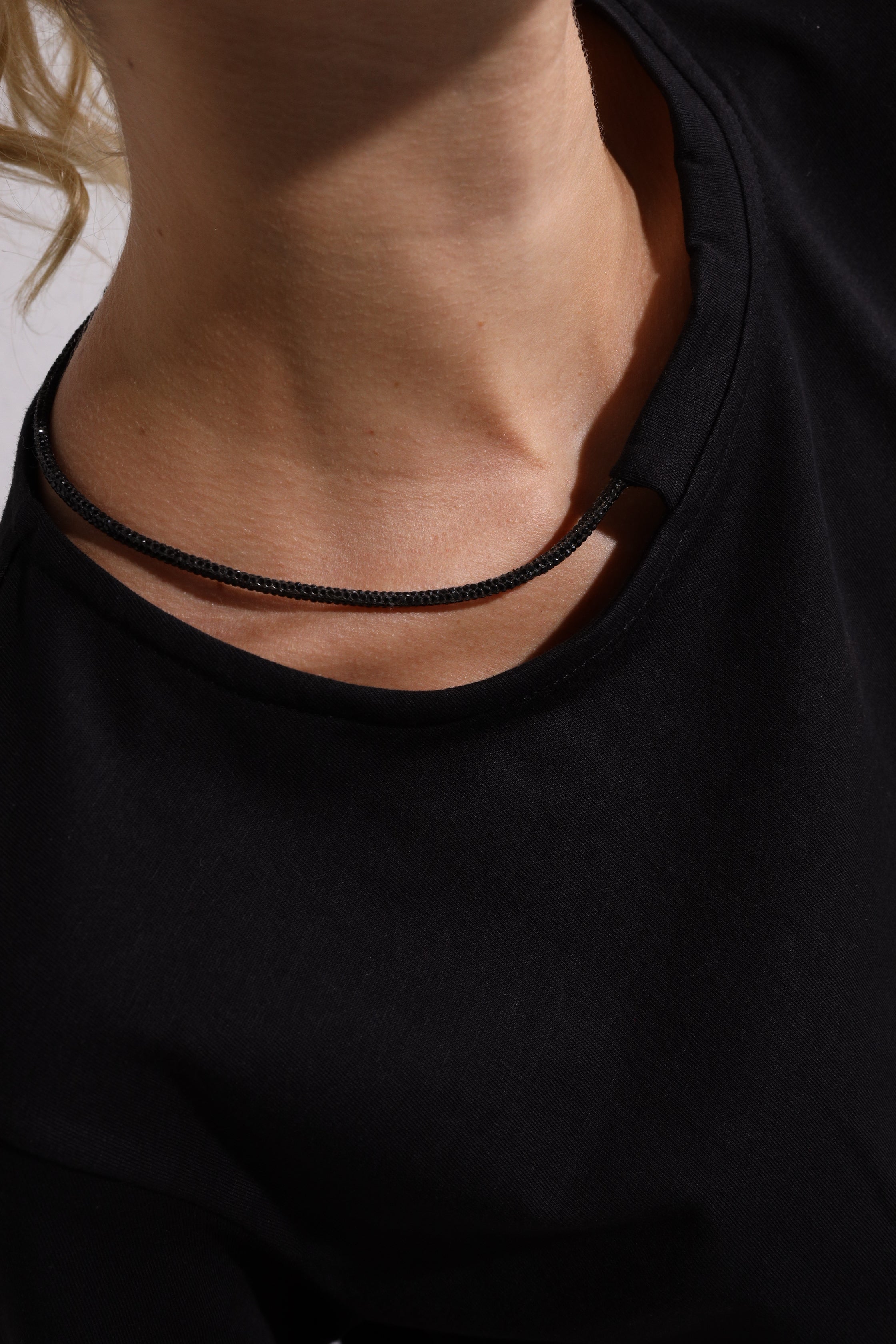 Black T-shirt with "Green Gold" drawstring